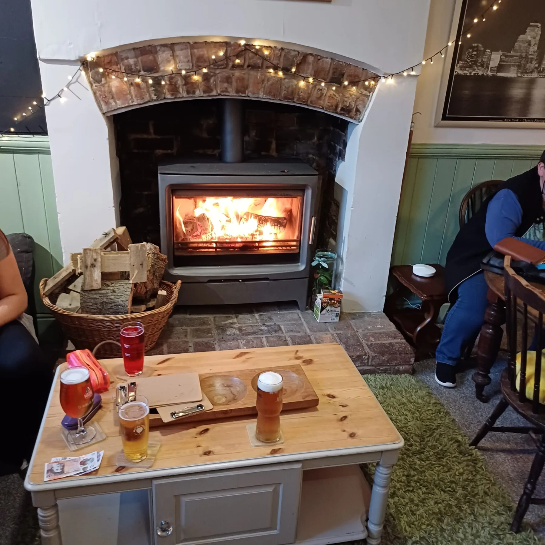 The fire lit in the front bar at The Red Lion, Huntley